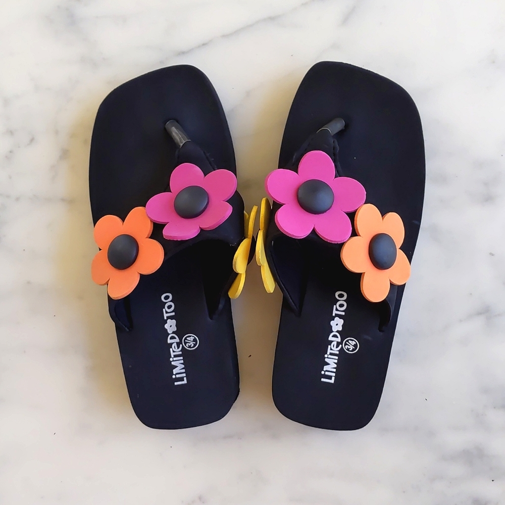 Limited Too Flip flops/Sandals with multi color flowers and 1 1/4" thick bottom.
